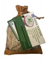 Mix of herbs for Tzatziki with a recipe on a fridge magnet