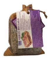 Mix of herbs for Mousaka with a recipe on a fridge magnet